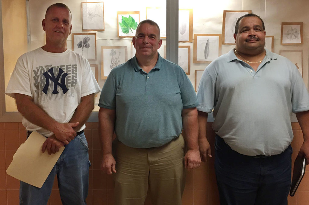 Facilities staff, John Oathout, Andy Deguire and Jeffery Palmer